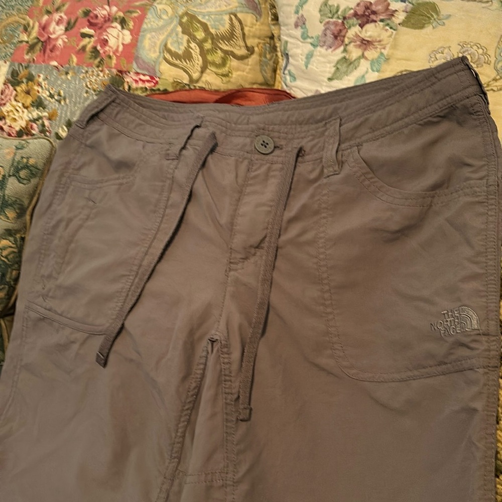 Size 10 women’s hiking pants by The North Face. Color green/grey.